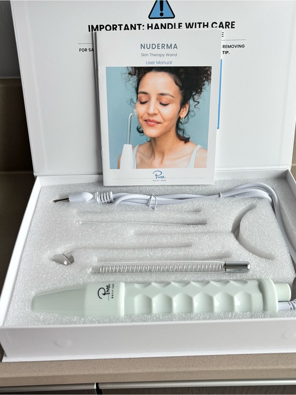 NuDerma Clinical Skin Therapy Wand by Pure Daily Care.